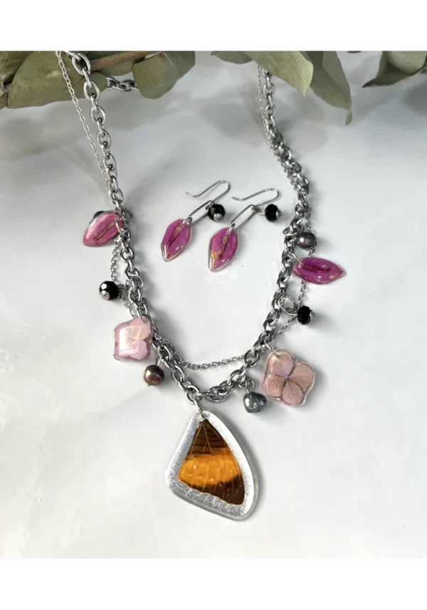 Collar multi dijes flores rosadas ala naranja Collar multi dijes flores rosadas ala naranja