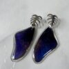 Arete alas topo acero