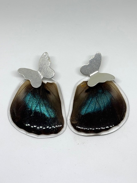 Arete alas topo bronce