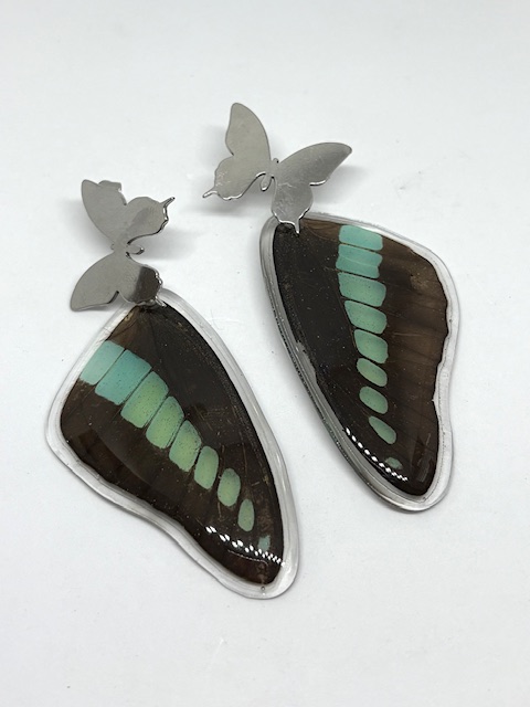 Arete alas topo acero