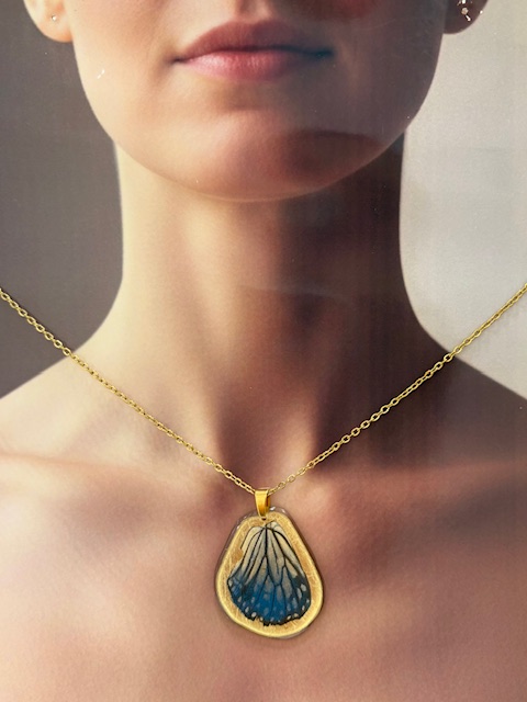collar ala y cadena