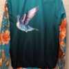 cb57ffc1-8e5d-4042-af77-1f11408ee525 Chaqueta aguamarina colibrí