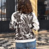 chaqueta pana blanco y negro jaguar